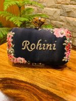 Floral name clutch