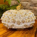 Embroidered clutch