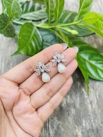 Ad flower with pearl earrings