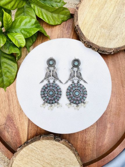 Two bird brass earrings