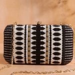 Designer clutch black stripe