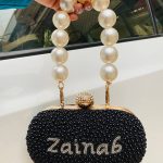 Pearl black handle clutch