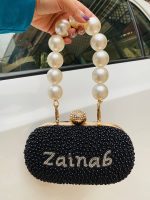 Pearl black handle clutch