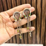 Peacock machli brass earrings