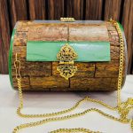 Wooden clutch with sling