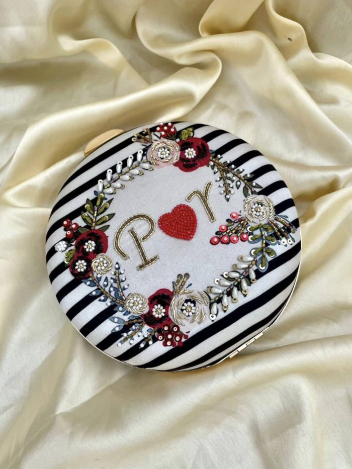 Embroidery round clutch - Image 1