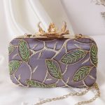 Purple embroidery clutch