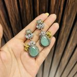 One cow brass Earrings Mint