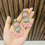Two peacock brass earrings Pink