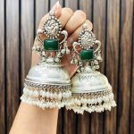 Geetika brass jhumka green
