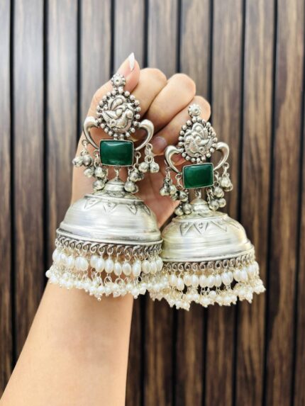 Geetika brass jhumka green