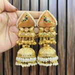 Bird brass jhumka peach