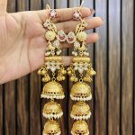 three jhumki brass earrings