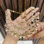 White bead golden necklace