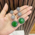Three circle brass earrings green