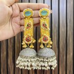 Supriya bird brass earrings mint