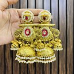 Shalini golden brass jhumka ruby