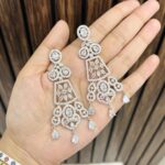 Manavi ad Earrings