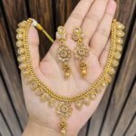 Rakhi Gold a like necklace