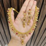 Rakhi Gold a like necklace Ruby