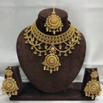 Tasha Gold a like necklace